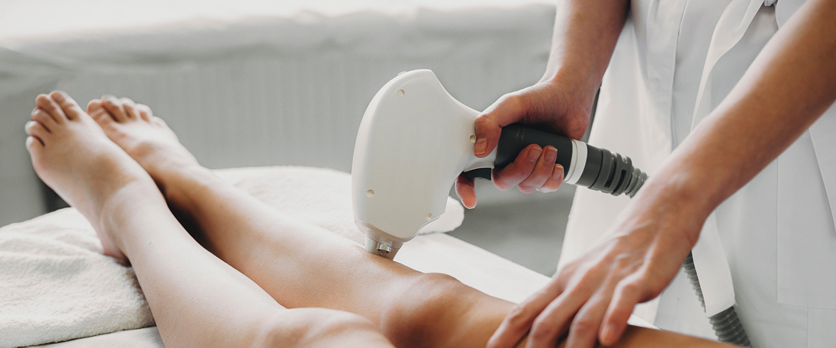 Woman with google receiving fraxel laser treatment